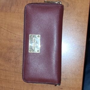 Michael Kors Wallet,  color is Burgandy/Mulberry.